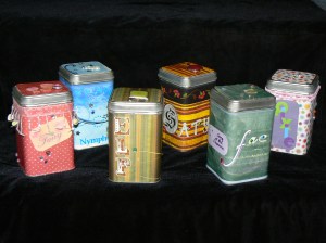 I gave away these homemade Fae Wishing Tins at my panel: with a luck penny, pixie dust, Charms candy, and one even included a thumb drive with my "Song of the Ocarina" ebook on it.